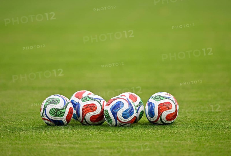 Adidas FIFA World Cup 2026 TRIONDA PRO balls lie on grass international soccer match, Germany, MEWA Arena Mainz, Rhineland-Palatinate, Germany