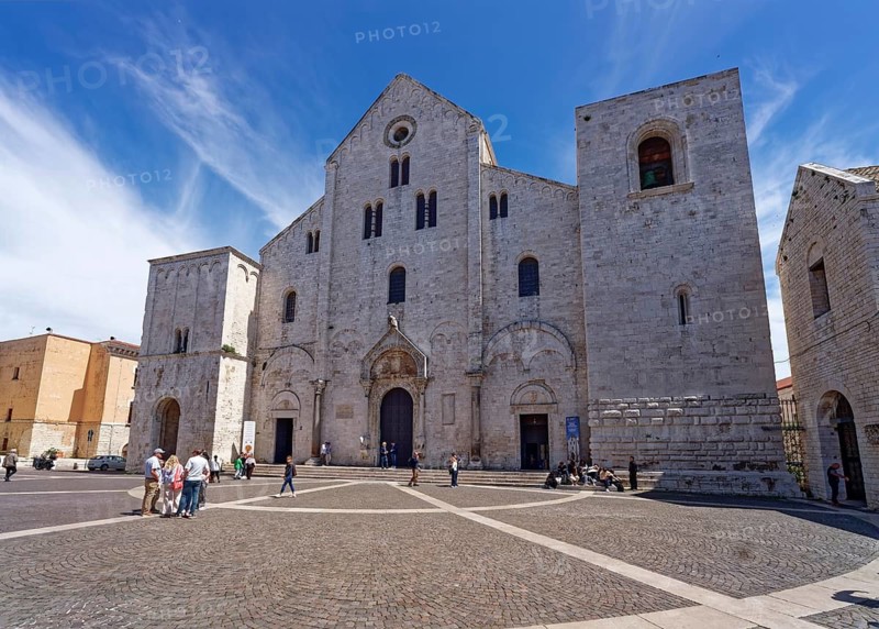 Basilica Pontificia San Nicola, Pontifical Basilica San Nicola, named after Nicholas of Myra, is a pilgrimage church for Roman Catholic and Orthodox Christians in Bari Veccia, the old town of the southern Italian city of Bari. The church is considered the founding building of the Barese Romanesque period. Bari, Apulia, Italy