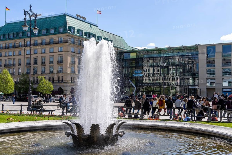 Landmark and tourist attraction, Pariser Platz with fountain and the Hotel Adlon, Berlin, Germany