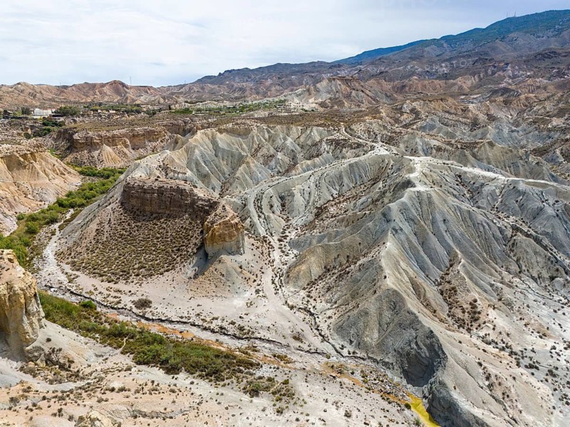 Breathtaking rock formations and deeply carved gorges in an arid landscape, aerial view, Tabernas Desert, Desierto de Tabernas, Tabernas, Almeria, Andalusia, Spain