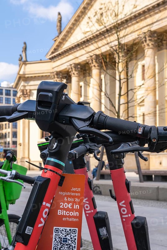 Electric scooters parked at the Gendarmenmarkt in Mitte, Berlin, Germany