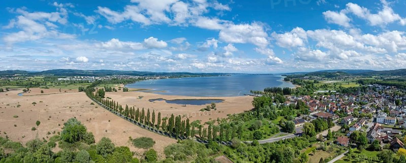 Aerial view, panorama of Mooser Damm with country road L192 which crosses Radolfzeller Aachried on the shore zone of western Lake Constance and connects the town of Radolfzell with the village of moss and the Mettnau peninsula, Konstanz district, Baden-Württemberg, Germany