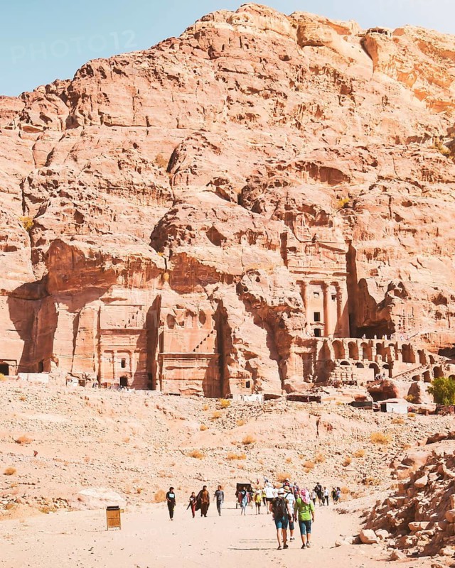 Panoramic view of Petra Royal Tombs including Urn Tomb, Silk Tomb, Corinthian Tomb and Palace Tomb carved into sandstone cliffs. Famous Nabataean burial monuments, UNESCO World Heritage site