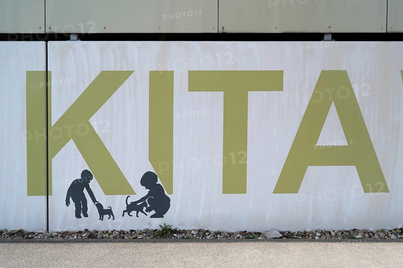 Figurative silhouettes on a wall of a Johanniter day care centre, Wendelstein, Middle Franconia, Bavaria, Germany