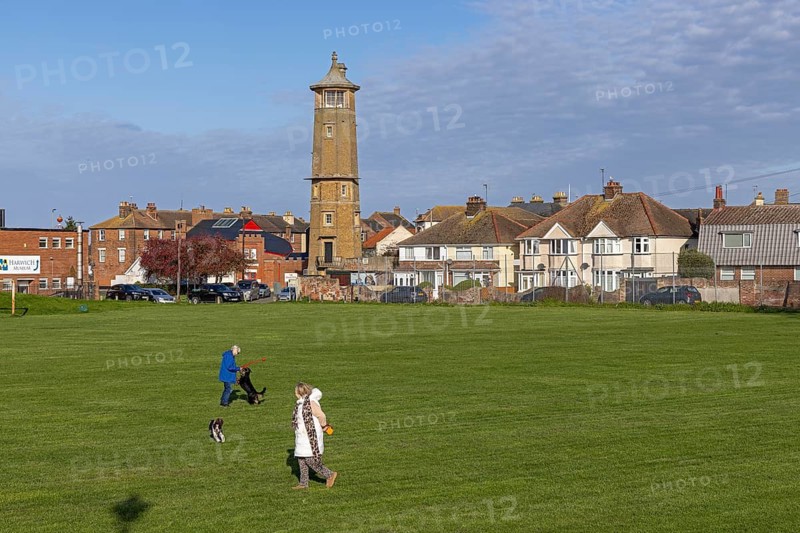 Old lighthouse, High Lighthouse, houses, green space The Green, people, dogs, Harwich, England, Great Britain