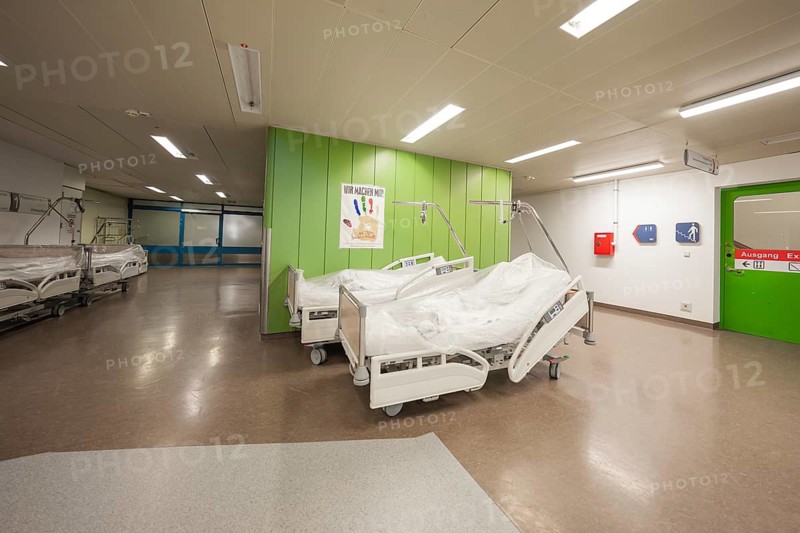 Hospital corridor with beds on the walls and green color theme, Nagold Hospital of the Southwest Clinic Network, Calw district, Germany