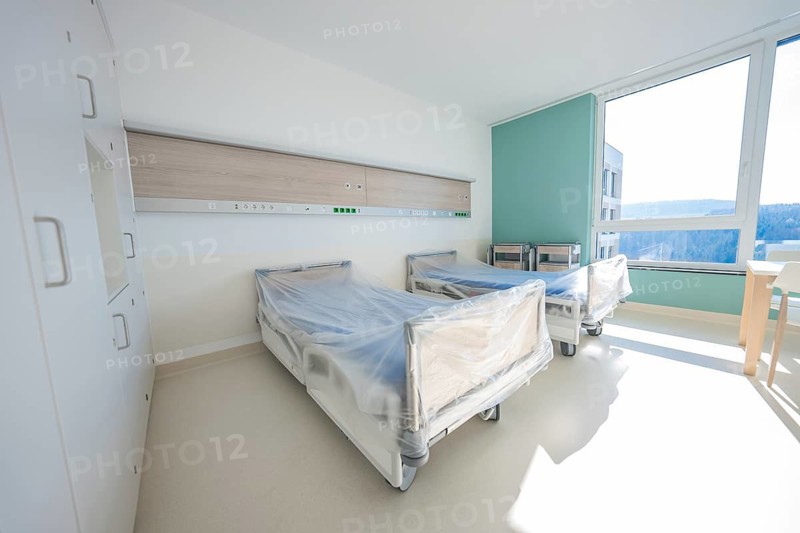 Bright hospital room with two beds in modern design, large windows, patient room cash desk in the new Calw hospital, Black Forest, Germany