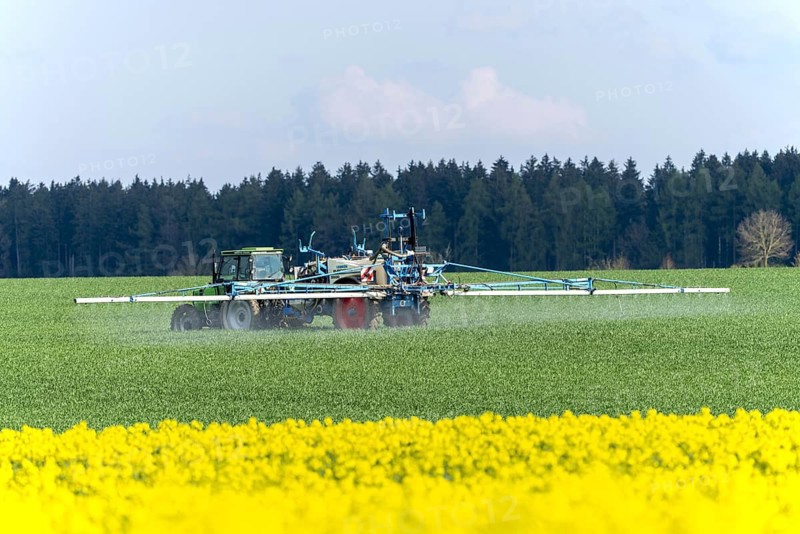Agriculture, pesticide being sprayed on a field in spring, Swabian Alb, Baden-Württemberg, Germany