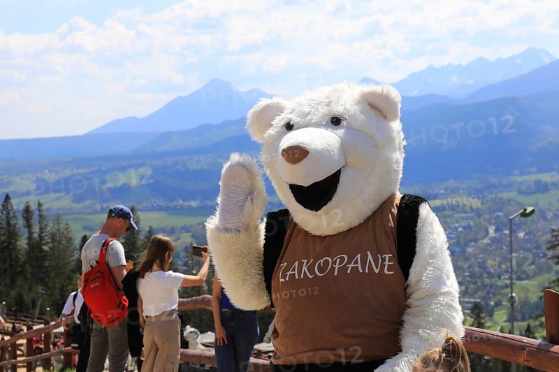 Polar bear mascot posing in the Polish city of Zakopane at the foot of the Tatra Mountains, the summit of Mount Gubalowka in Zakopane, Poland