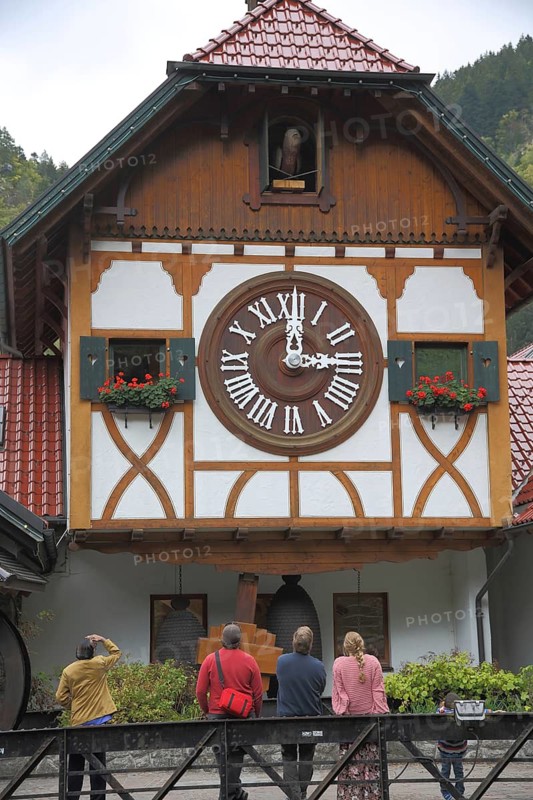 World's largest cuckoo clock and tourists watching clock games, historic building, world record, oversize, XXL, Eble clock park, Triberg, Südschwarzwald, Black Forest, Baden-Württemberg, Germany