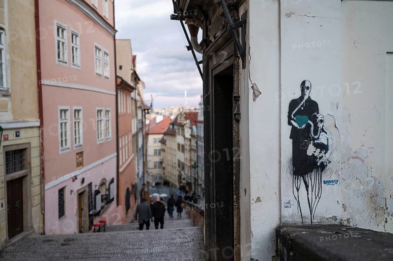 PRAGUE, CZECHIA - MARCH 25, 2023: Banksy graffitti on the wall.