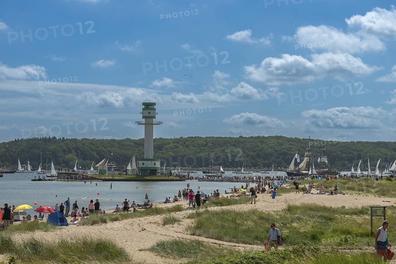 Windjammer Parade 2025 on the Kiel Fjord at the end of Kiel Week, tall ships, three-masters, spectators, Falkensteiner Strandleben, lighthouse, summer weather, sunshine, forest, Kiel, Schleswig-Holstein, Germany