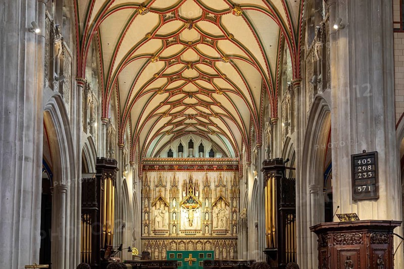 Fan-vaulted ceiling view to altar reredos, Church of Saint Mary, Ottery St Mary, Devon, England, UK