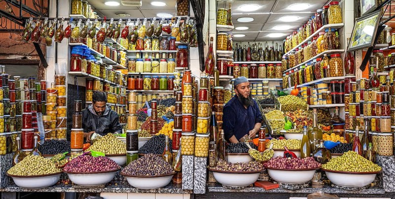 Stalls selling pickled olives, lemons and other vegetables, souk, bazaar, Marrakech, Maghreb, Morocco, North Africa