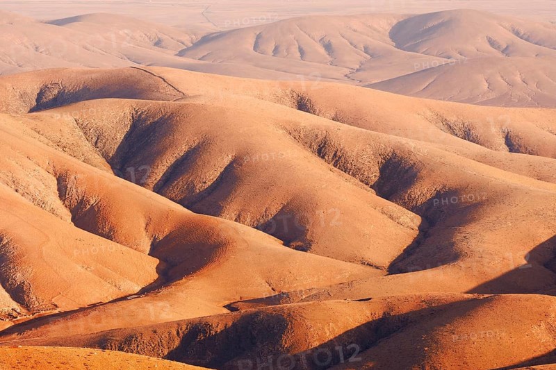 View of the barren and eroded landscape from the Mirador Morro Velosa viewpoint, Fuerteventura, Canary Islands, Spain