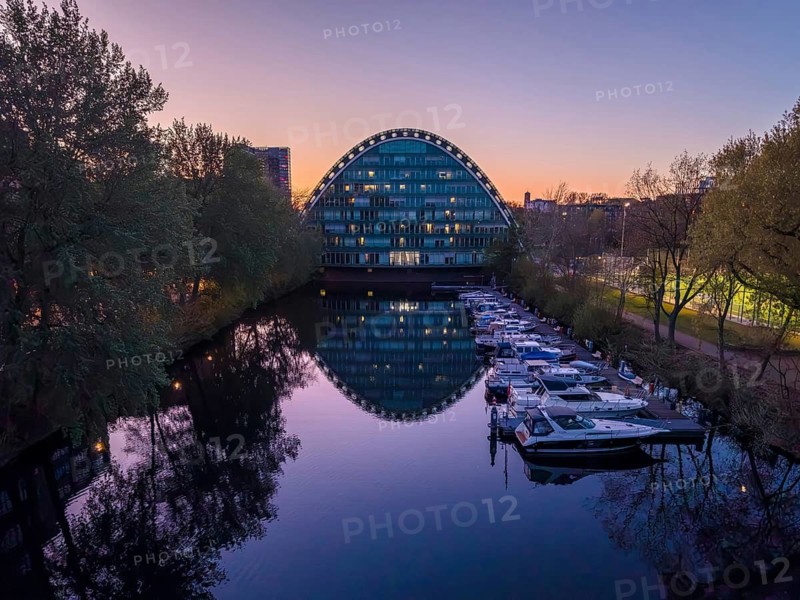 Aerial view of BBCC Berliner Bogen Conference Center at blue hour with Bille flood basin in the foreground, Hammerbrook, Hamburg, Germany