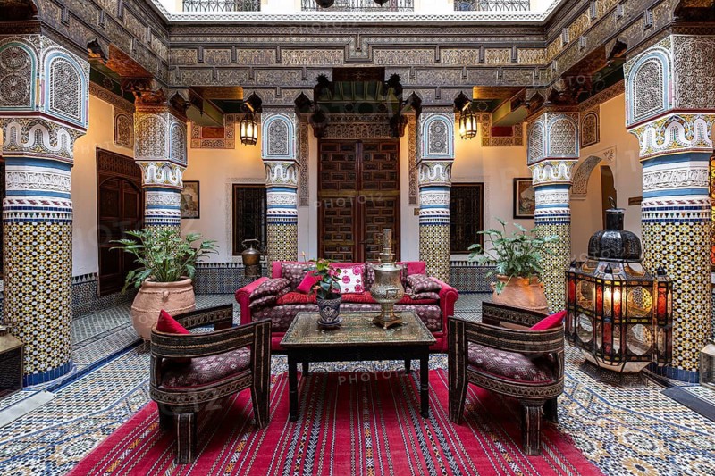 Oriental courtyard with carpet and beautiful furnishings at Hotel Riad Palais Sebhan, former city palace, Medina, Marrakech, Maghreb, North Africa, Morocco
