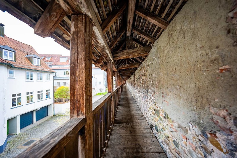 Covered wooden walkway along an old city wall, rustic and historic ambiance, Isny, Allgäu, Bavaria, Germany