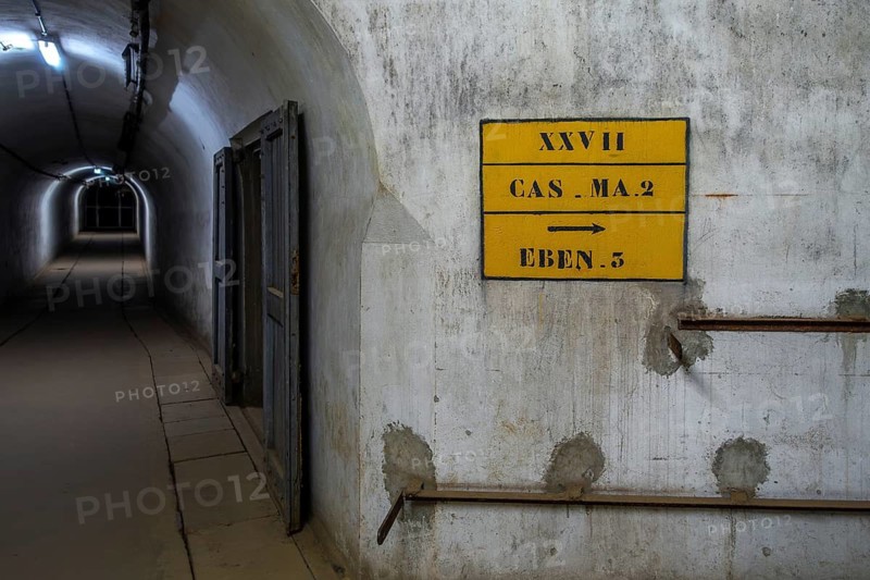 Directions in underground gallery, corridor, tunnel at Fort Eben-Emael, Belgian WW2 fortress during the Second World War Two in Belgium