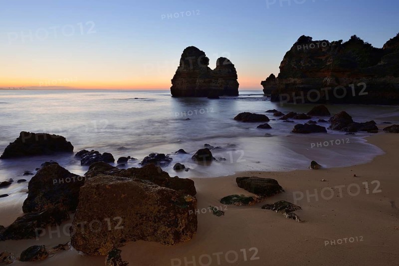 Beach and rock formations at dawn, Praia do Camilo, Lagos, Algarve, Portugal