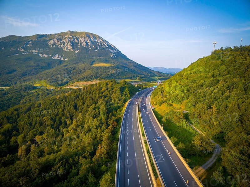 Dramatic aerial view of mountains and roads in Slovenia. Central Europe. Slovenia