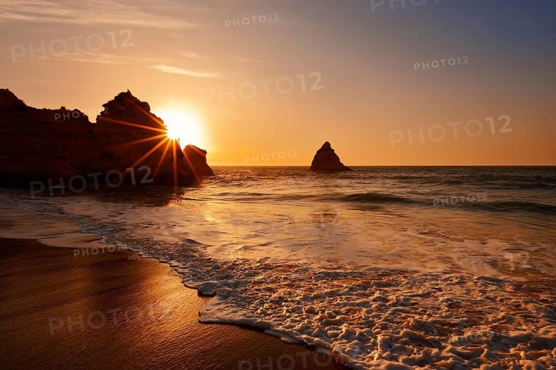 Beach and rocky coast at sunrise, Praia Dona Ana, Lagos, Algarve, Portugal