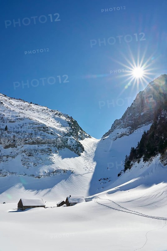 Snowy alpine winter landscape in the Alpstein, Säntis mountain range, Brülisau, Kanton Appenzell, Switzerland