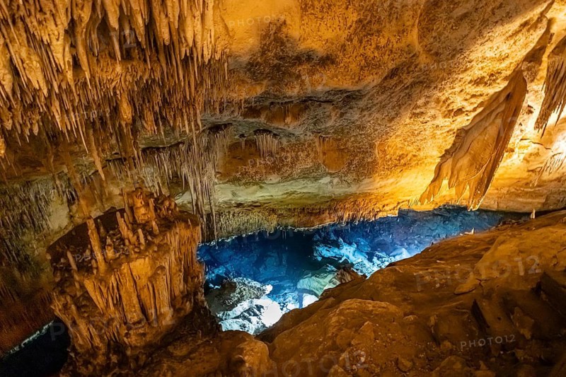 The Cuevas del Drach (Dragon Caves) are an impressive cave system on the east coast of Majorca, near Porto Cristo. They stretch for around 1, 200 metres and are home to Lago Martel, one of the largest underground lakes in Europe. The caves are famous for their fascinating stalactite and stalagmite formations, as well as their atmospheric lighting and the daily live classical concerts held on the lake. Cuevas del Drach, Porto Cristo, Majorca, Spain