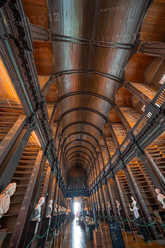 High vaulted ceiling in a historic library with elegant wood structure, Trinity Collage, Dublin, Ireland