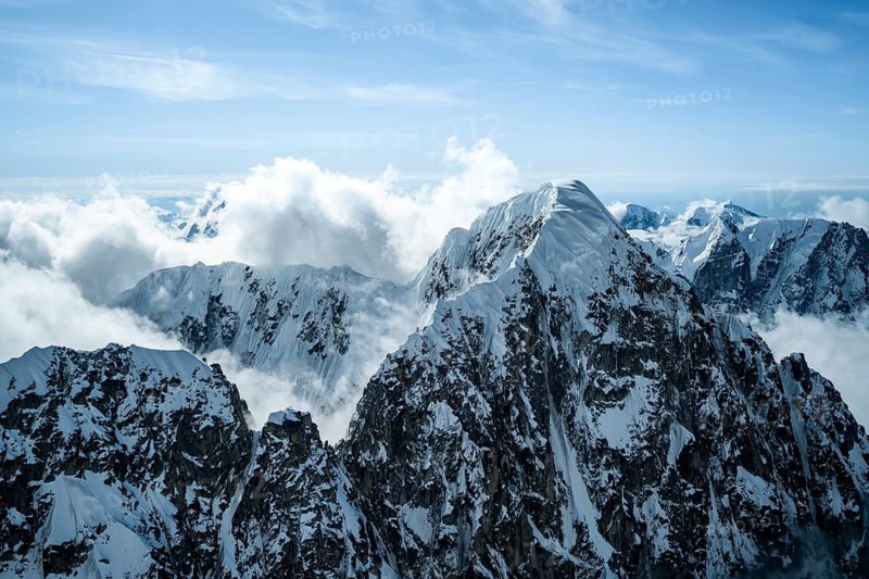 Summit of high mountains with glaciers, extreme ridge of Mount Huntington, 3731 m, aerial view, Alaska Range, Denali National Park, Alaska, USA