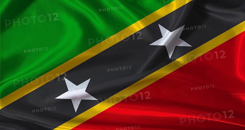 National flag of Saint Kitts and Nevis with cloth texture. Saint Kitts and Nevis flag with realistic texture background