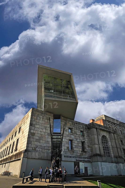 Modern entrance to the documentation center, Reichsparteitagsgelände 1933-1945, former Congress Hall of the NSDAP, a group of students waiting in front, Cloudy Sky, Bayernstraße 110, Nuremberg, Middle Franconia, Bavaria, Germany