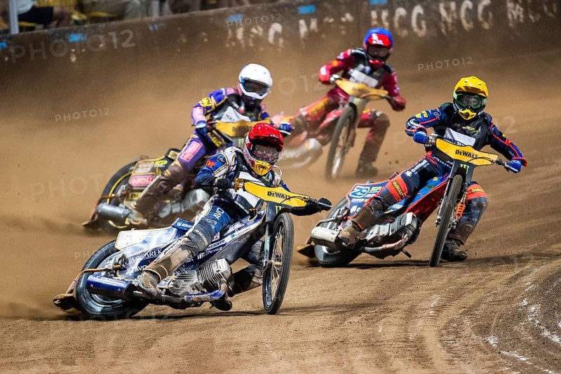 WROCLAW, POLAND - JUNE 20, 2026: DEWALT FIM Speedway GP of Poland. Speedway riders competing on dirt track. Heat 20.Andzejs Lebedevs (Y) Robert Lambert (R) Kacper Woryna (W) Max Fricke (B)