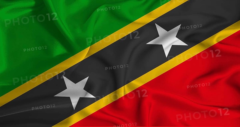 Realistic Saint Kitts and Nevis flag waving. Close up of flag of Saint Kitts and Nevis with cloth texture