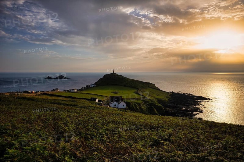 Chimney of a former mine, tin mine, copper mine, in memory of mining, Cape Cape Cornwall, behind rock formation, island, The Brisons, sea, evening, sunset, St Just in Penwith, Cornwall, England, Great Britain, Great Britain