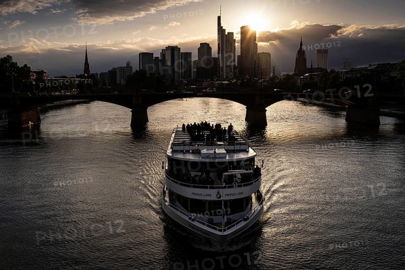 The sun sets behind Frankfurt's banking skyline, Frankfurt am Main, Hesse, Germany