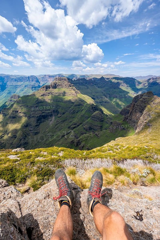 Hikers, mountain scenery of the Cathedral Range, view from Cathedral Peak or Cathedral Piek or Mponjwana, Drakensberg Mountains, KwaZulu-Natal, South Africa