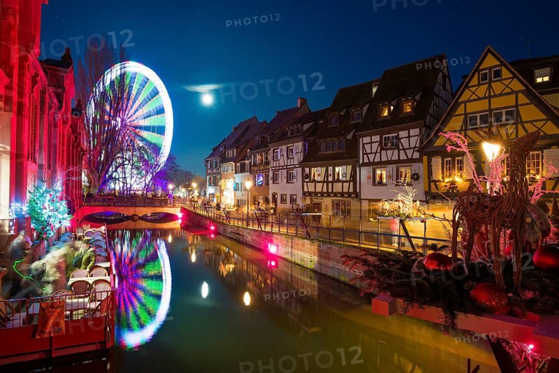 Colourfully illuminated and Christmassy decorated half-timbered houses, old town, blue hour, Colmar, Haut-Rhin department, Alsace, France