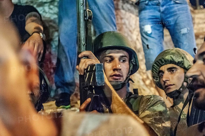 Istanbul, Turkey. 16th July 2016. Turkish soldiers guard the Republic Monument in Taksim Square, Istanbul, Turkey on the night of an attempted coup d'état against the Akp ruling government of Recep Tayyip Erdogan