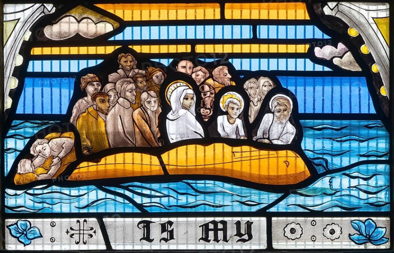 Detail modern stained glass depicting refugee crisis people in small boat, by Ealish Swift 2023, St Mary Redcliffe Church, Bristol, England, UK