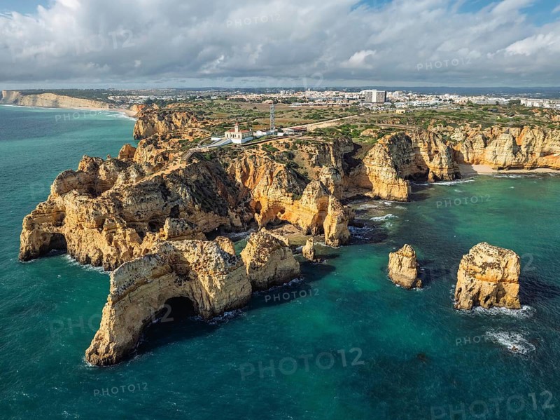 Aerial view of Ponte da Piedade in Lagos, Algarve, Portugal, with ocean channels, cliff faces and sea stacks