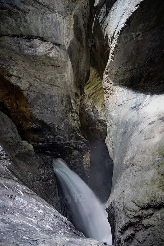 Waterfall in a rocky gorge of Trümmelbach, Trümmelbach Falls, long time exposure, Lauterbrunnen, Bernese Oberland, Switzerland
