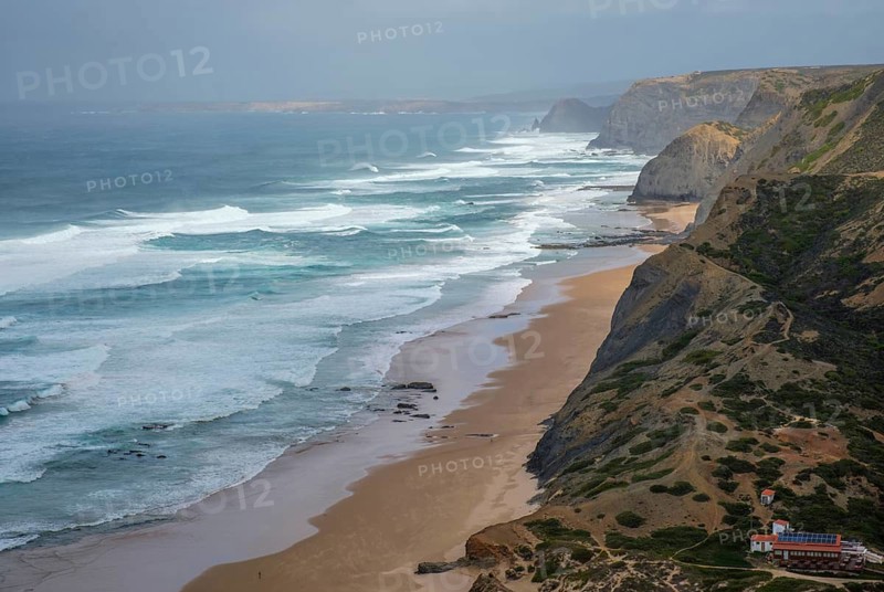 Castelejo Viewpoint above Praia do Castelejo in Vila do Bispo, Algarve, Portugal, with Atlantic ocean, cliffs, beach, and rolling surf