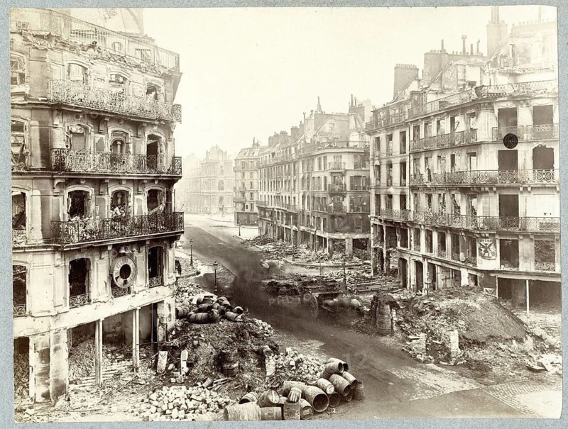 Paris, Paris Commune, Uprising, Revolution, destruction by military fire, dilapidated buildings and rubble line an abandoned street in a war zone, Bruno Braquehais, 1823-1879, May 1871
