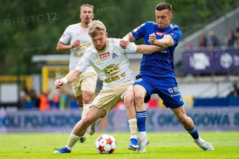 LEGNICA, POLAND - MAY 17, 2026: Football match polish Betclic 1. first league between Miedz Legnica - Ruch Chorzow. In action Jakub Jendryka (L) Zvonimir Petrovic (R)