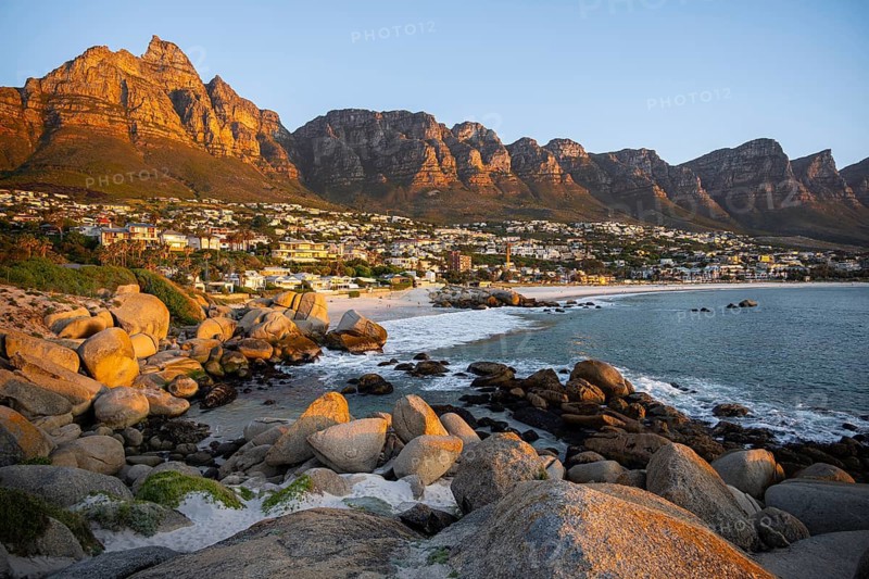 Evening on the coast, beach near Camps Bay, with table mountains, blue sea, Cape Town, South Africa