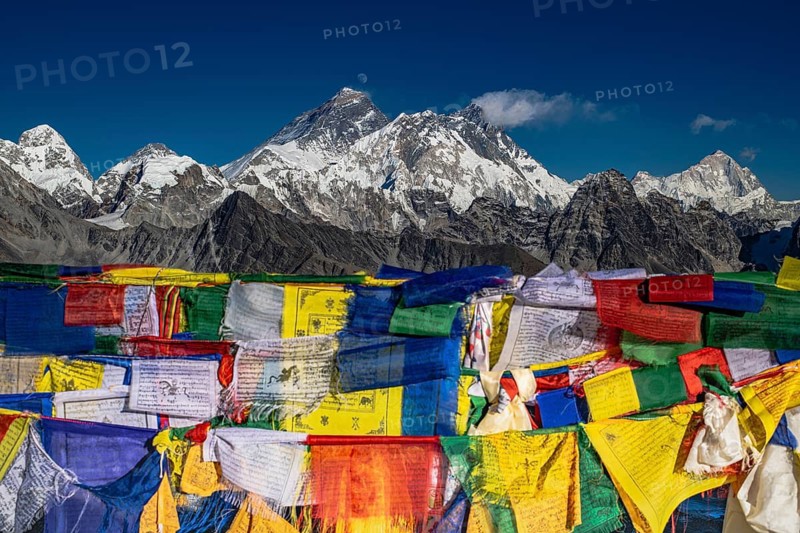 View from Renjo La Pass, 5360 m with Buddhist prayer flags with holy mantras with views of the Himalayan chain with Mount Everest, Lhotse and Makalu. Solu Khumbu, Himalayas, Nepal