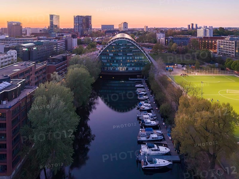 Aerial view of the BBCC Berliner Bogen Conference Center and the city of Hamburg at blue hour with Bille flood basin in the foreground, Hammerbrook, Hamburg, Germany