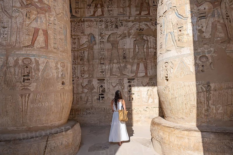 Luxor, Egypt. January 6th 2026. A foreign tourist admires reliefs and hieroglyphs inside Medinat Habu, the ancient Egyptian Mortuary Temple of Ramesses III on the West Bank of The Nile, Luxor, Egypt