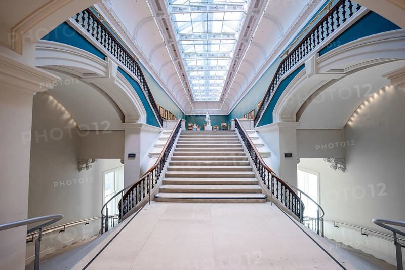 Grand staircase in an art gallery with skylight and elegant details. Symmetrical design, National Gallery of Ireland, Dublin, Ireland